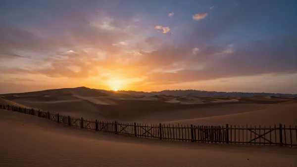 Cinematic Sunset Over Dunes
