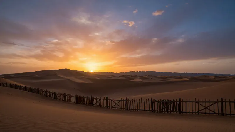 Cinematic Sunset Over Dunes