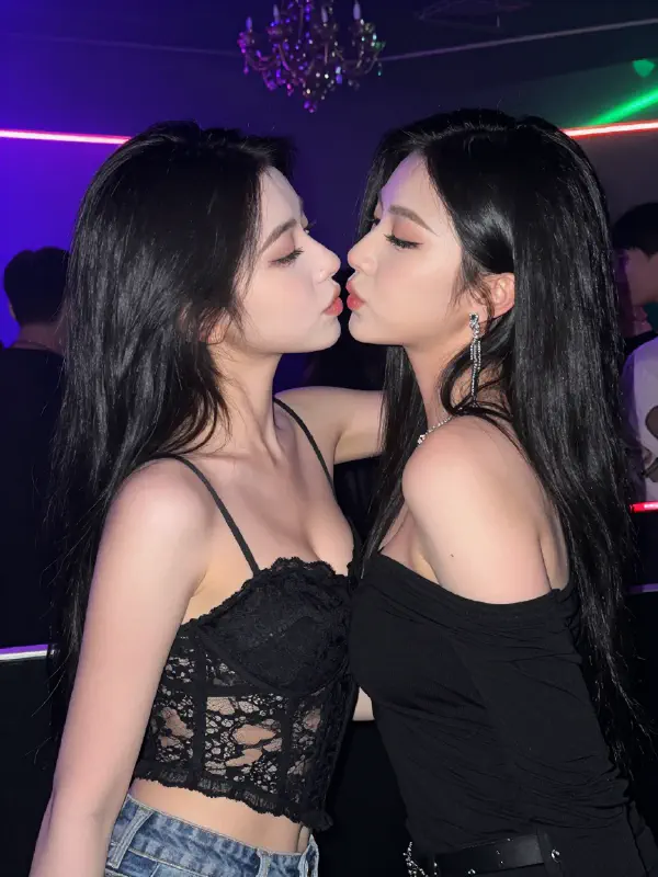 Club intimacy in neon glow
