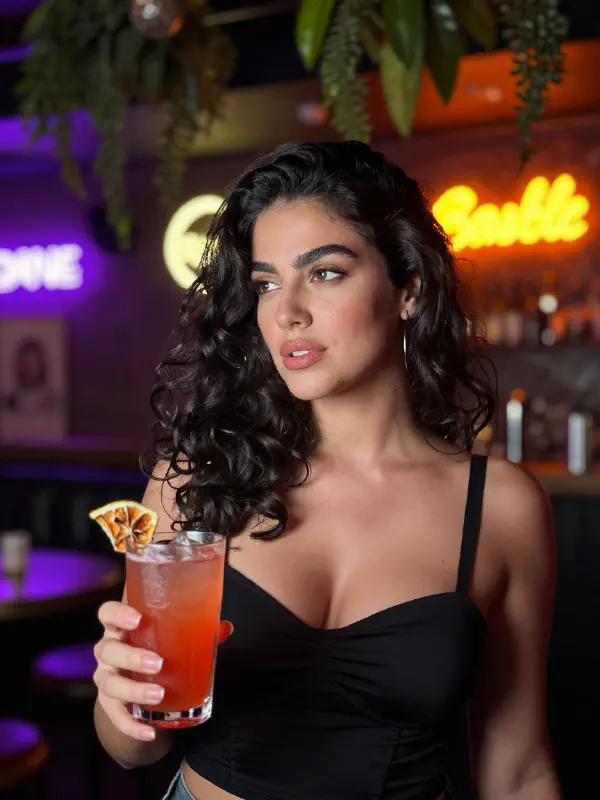 Neon Bar Scene with Elegant Woman